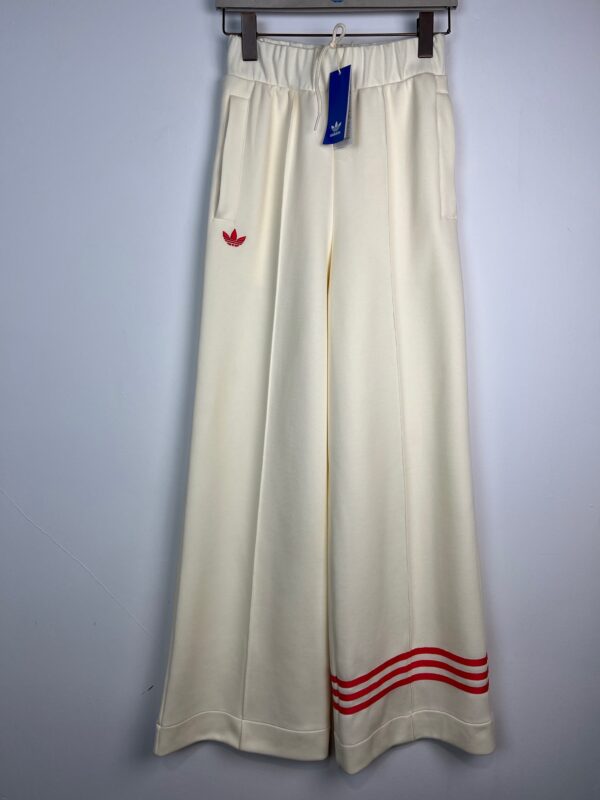 Spodnie damskie Adidas Neucl Trackpant kremowe XS