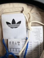 Kurtka męska wiatrówka Adidas x Oasis Coach Jacket beżowa 2XL - obrazek 3